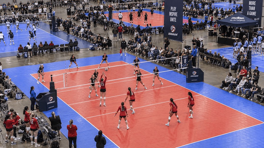 Indoor volleyball tournament in a packed arena
