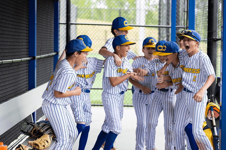 Youth baseball team celebrating