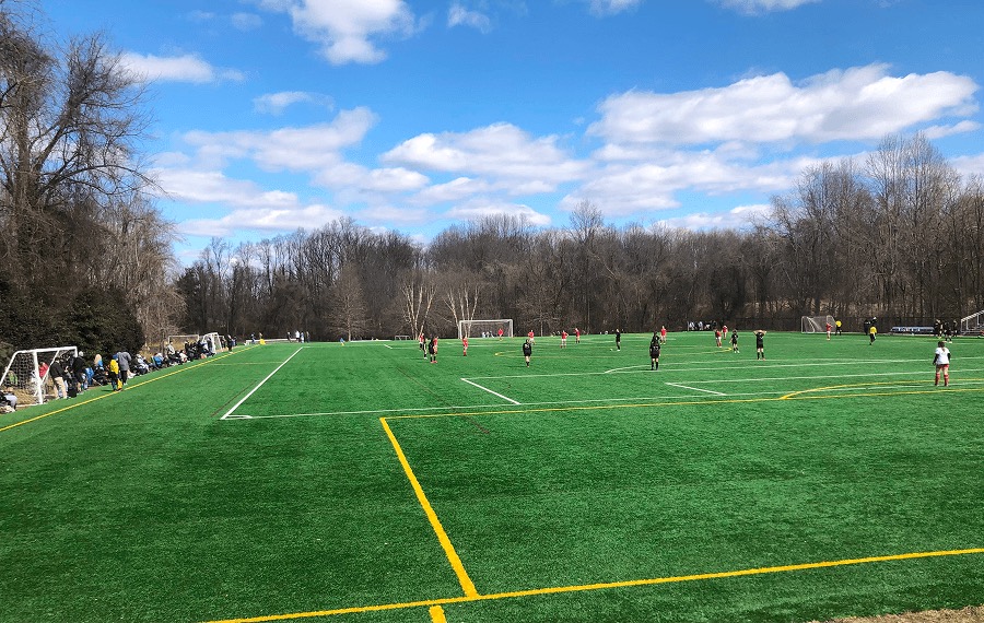 Soccer field under autumn trees